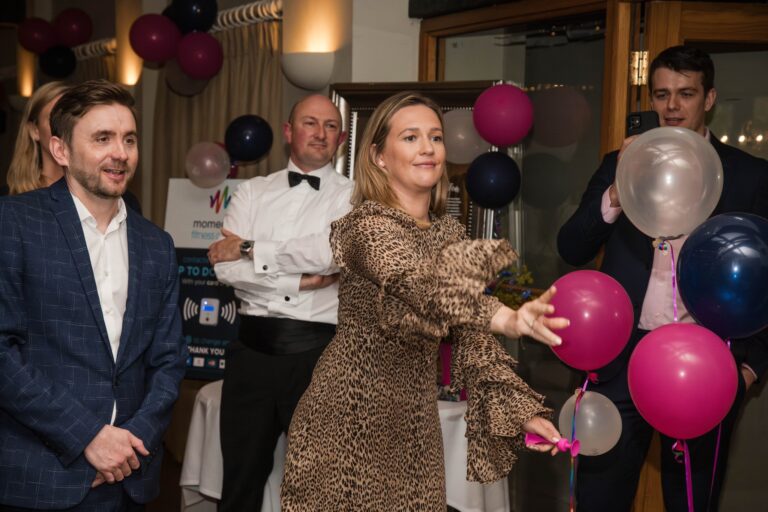 Guests celebrating with colourful balloons at a charity fundraising evening hosted by Kevin Durham Guests celebrating with colourful balloons at a charity fundraising evening hosted by Kevin Durham
