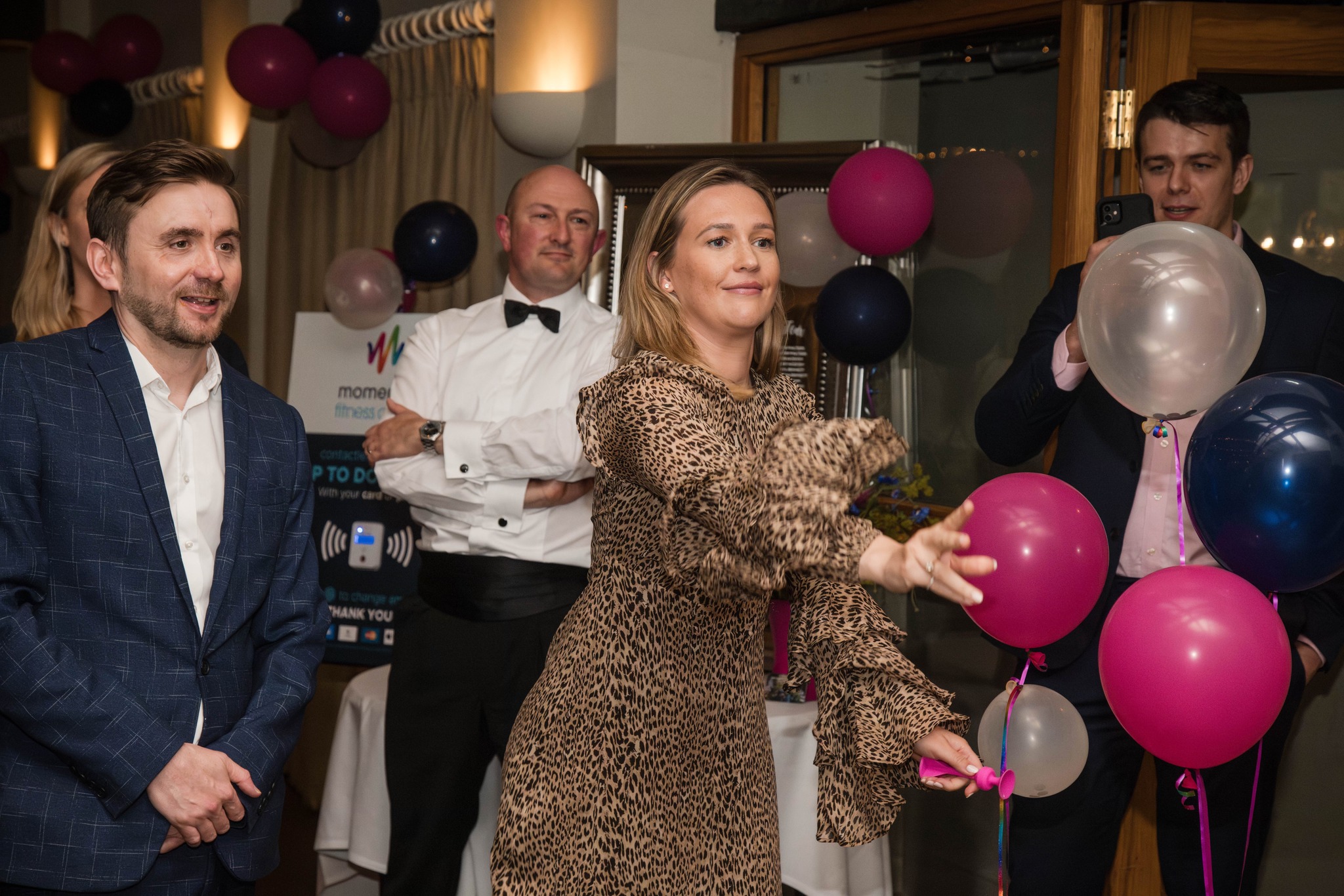Guests celebrating with colourful balloons at a charity fundraising evening hosted by Kevin Durham Guests celebrating with colourful balloons at a charity fundraising evening hosted by Kevin Durham