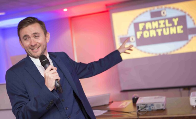 Kevin Durham hosting a Family Fortunes game show round Kevin Durham hosting a Family Fortunes game show round