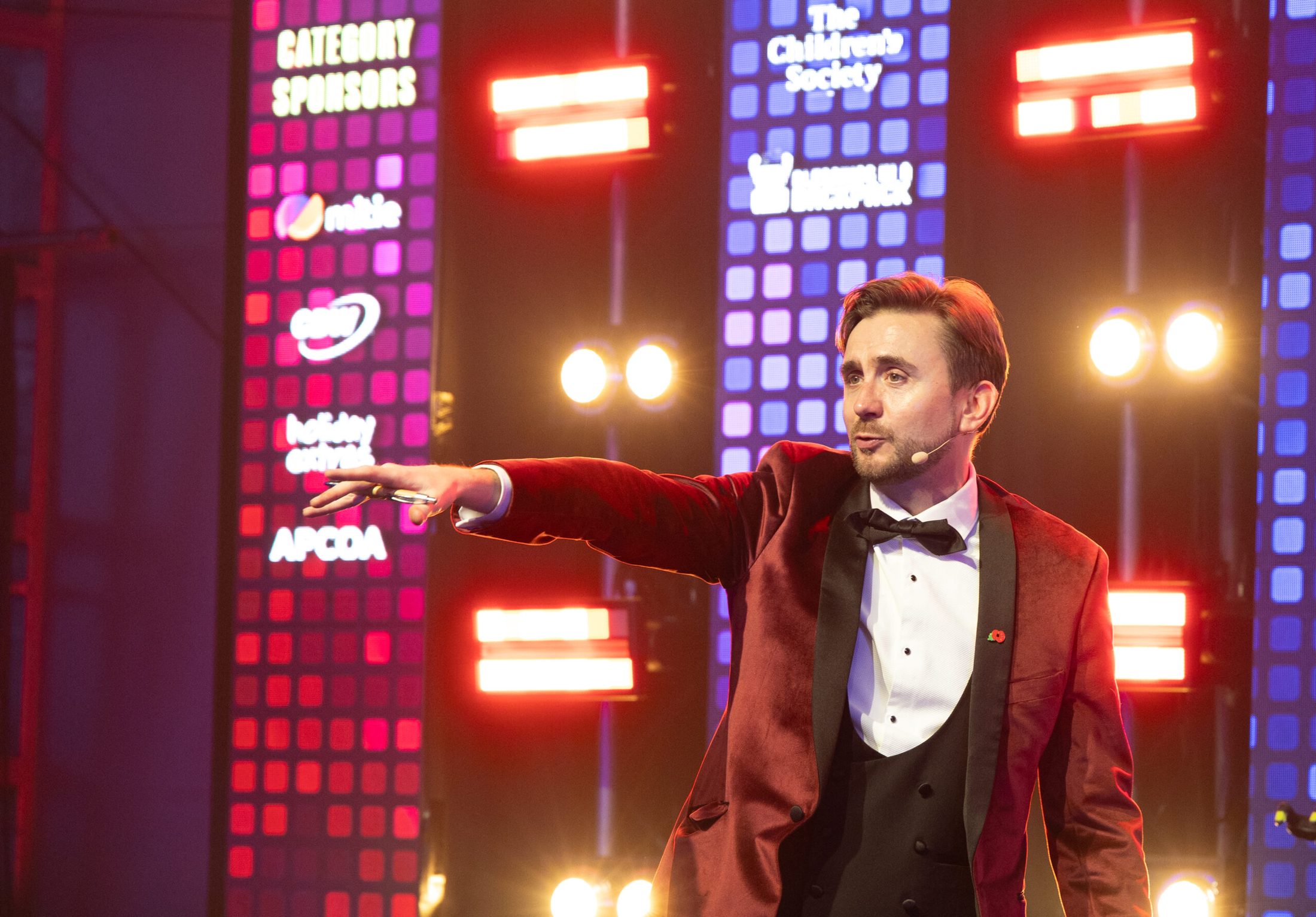 Charity auctioneer Kevin Durham hosting MAG-FEST, the Manchester Airport Group's charity gala, running the live auction and live pledge in aid of Medcare, Magic Breakfast, The Children's Society and Blessings in a Backpack.